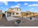 Landscaped backyard with gazebo, fire pit, and gravel at 19961 W Heatherbrae Dr, Litchfield Park, AZ 85340