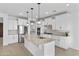 Modern kitchen with stainless steel appliances and granite countertops at 19961 W Heatherbrae Dr, Litchfield Park, AZ 85340