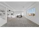 Open living area showcasing neutral color palette and ample natural light at 19961 W Heatherbrae Dr, Litchfield Park, AZ 85340