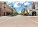 Street view of shops and restaurants in a community at 19961 W Heatherbrae Dr, Litchfield Park, AZ 85340