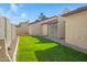 A row of houses with red tile roofs and green grass at 2059 E Brown Rd # 23, Mesa, AZ 85213