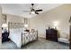 Main bedroom with neutral carpet, and ceiling fan at 2059 E Brown Rd # 23, Mesa, AZ 85213