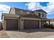 Two-story house with brown garage doors and landscaping at 2071 E Piedmont Pl, Casa Grande, AZ 85122