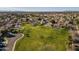 Aerial view of community featuring green spaces, a park, and residential homes at 2265 E Mallard Ct, Gilbert, AZ 85234