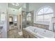 Spa-like bathroom with soaking tub and walk-in shower at 2265 E Mallard Ct, Gilbert, AZ 85234