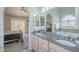 Double vanity bathroom with granite countertop and large tub at 2265 E Mallard Ct, Gilbert, AZ 85234