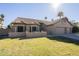 Single-story home with two-car garage and well-manicured lawn at 2265 E Mallard Ct, Gilbert, AZ 85234