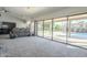 Bright Gathering room with pool view and sliding glass doors at 2265 E Mallard Ct, Gilbert, AZ 85234