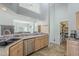 Kitchen with island, sink, and stainless steel dishwasher at 2265 E Mallard Ct, Gilbert, AZ 85234