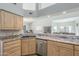 Modern kitchen with double sink and stainless steel dishwasher at 2265 E Mallard Ct, Gilbert, AZ 85234