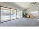 Living room with sliding doors leading to the pool and patio area at 2265 E Mallard Ct, Gilbert, AZ 85234