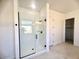 Modern bathroom with white tile and a large walk-in shower at 22910 E Alyssa Rd, Queen Creek, AZ 85142