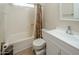 Simple bathroom with shower/tub combo and white vanity at 2613 E Michigan Ave, Phoenix, AZ 85032