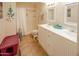 Clean bathroom with double vanity and a shower/tub combo at 2613 E Michigan Ave, Phoenix, AZ 85032