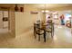 Dining area with a four-seat table and chandelier at 2613 E Michigan Ave, Phoenix, AZ 85032