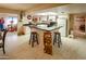 Eat-in kitchen with ample counter space and white cabinets at 2613 E Michigan Ave, Phoenix, AZ 85032