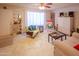 Bright living room featuring comfy seating and large window at 2613 E Michigan Ave, Phoenix, AZ 85032