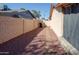 Side yard with stepping stones and gravel at 2613 E Michigan Ave, Phoenix, AZ 85032