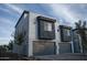 Contemporary two-story home with a two-car garage and modern facade at 2830 N 19Th Ave, Phoenix, AZ 85009