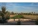 Scenic view of a golf course with city skyline in the background at 2830 N 19Th Ave, Phoenix, AZ 85009