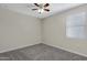 Bright bedroom with ceiling fan and window blinds at 29402 W Mitchell Ave, Buckeye, AZ 85396