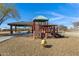 playground with play structures and shaded area at 29402 W Mitchell Ave, Buckeye, AZ 85396