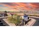 House with solar panels, aerial view showcasing the property and surrounding neighborhood at 3234 S Bowman Rd, Apache Junction, AZ 85119