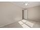 Bright bedroom with ceiling fan and carpet at 3234 S Bowman Rd, Apache Junction, AZ 85119