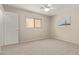 Bedroom with ceiling fan and window at 3234 S Bowman Rd, Apache Junction, AZ 85119