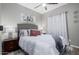 Guest bedroom with ceiling fan and neutral decor at 337 W Stanley Ave, San Tan Valley, AZ 85140