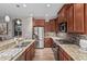 Modern kitchen with stainless steel appliances and granite countertops at 337 W Stanley Ave, San Tan Valley, AZ 85140