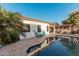 Relax by the pool and expansive patio with pergola at 337 W Stanley Ave, San Tan Valley, AZ 85140