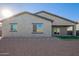 New construction home with backyard and artificial turf at 34909 N Palm Dr, San Tan Valley, AZ 85140