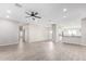 Spacious living room with tile flooring and a ceiling fan at 34909 N Palm Dr, San Tan Valley, AZ 85140