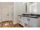 Modern bathroom with double vanity and a glass shower at 36747 W Harrison St, Tonopah, AZ 85354