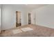 Spacious bedroom with access to a bathroom and other rooms at 36747 W Harrison St, Tonopah, AZ 85354