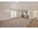 Bright and airy living room with open concept floor plan at 36747 W Harrison St, Tonopah, AZ 85354