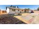 Large backyard with covered patio and ample space at 3744 W Malapai Dr, Phoenix, AZ 85051