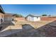 View of backyard, shed, and patio at 3744 W Malapai Dr, Phoenix, AZ 85051