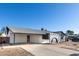 Front view of a single story home with a carport at 3744 W Malapai Dr, Phoenix, AZ 85051