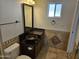 Bathroom with granite vanity and updated fixtures at 4054 E Clovis Cir, Mesa, AZ 85206