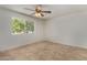 Bedroom with tile flooring, ceiling fan, and a sunny window view at 4054 E Clovis Cir, Mesa, AZ 85206