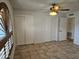 Spacious bedroom with large closets and ceiling fan at 4054 E Clovis Cir, Mesa, AZ 85206