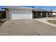 Spacious driveway leading to the house's garage at 4054 E Clovis Cir, Mesa, AZ 85206