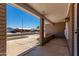 A cozy porch offers a welcoming entrance with views of the well-kept neighborhood at 4054 E Clovis Cir, Mesa, AZ 85206