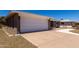 A well-maintained two-car garage with a large driveway provides ample parking at 4054 E Clovis Cir, Mesa, AZ 85206
