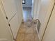 Hallway with tile flooring and decorative inlay at 4054 E Clovis Cir, Mesa, AZ 85206