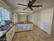 Spacious kitchen with granite island and updated appliances at 4054 E Clovis Cir, Mesa, AZ 85206