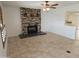 Living room showcasing a fireplace and access to kitchen at 4054 E Clovis Cir, Mesa, AZ 85206