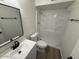 Clean bathroom with shower/tub combo and modern vanity at 4062 W Camino Acequia St, Phoenix, AZ 85051